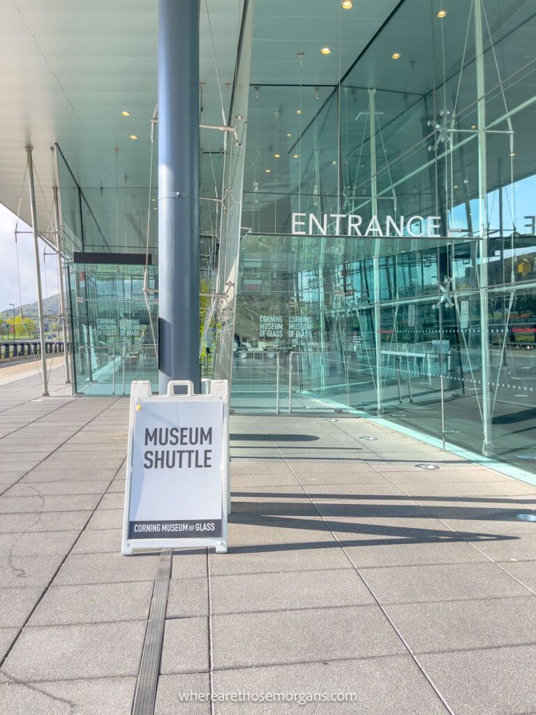 Entrance and museum shuttle sign for visitors