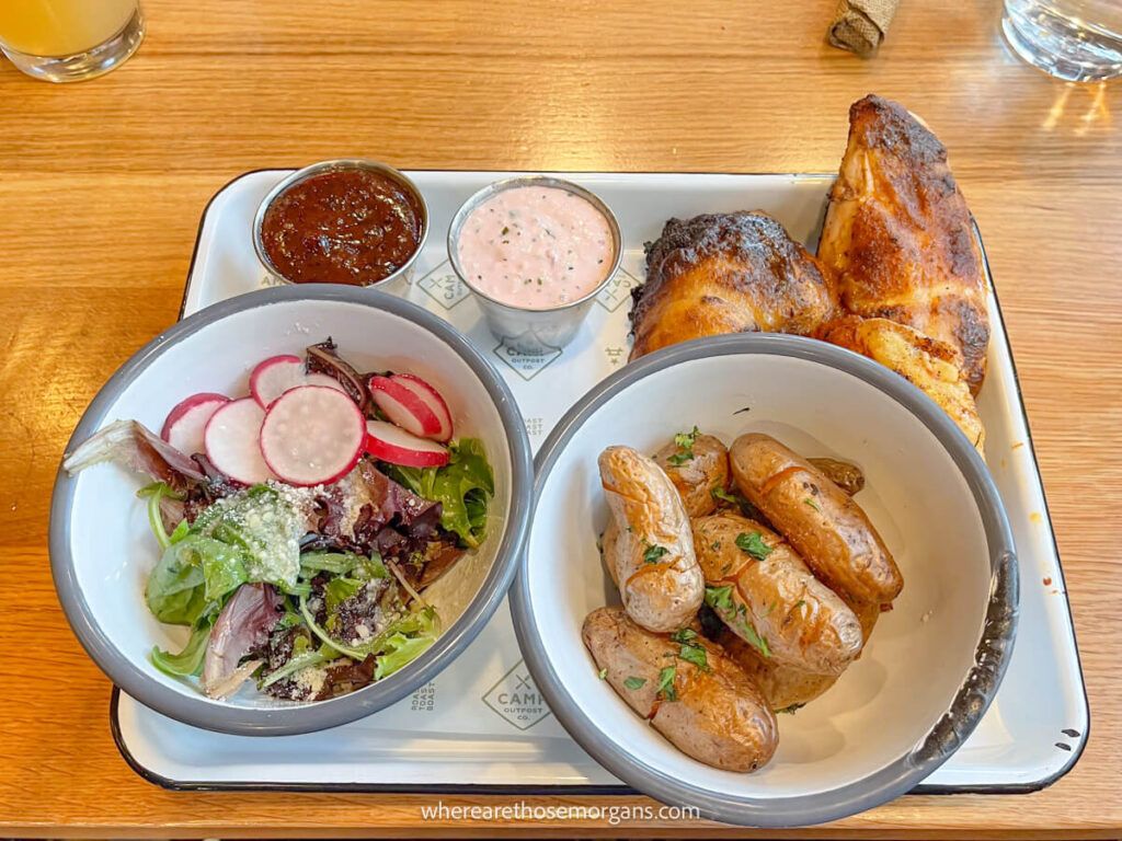 Healthy meal of potatoes chicken and salad on a tray in Utah