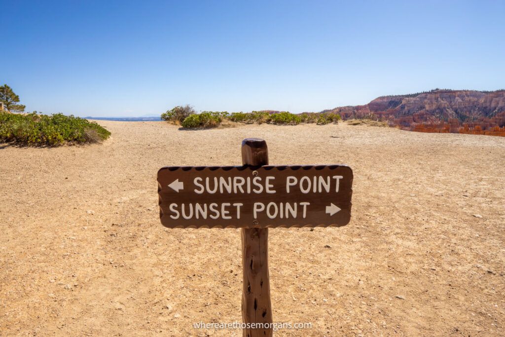Sign showing directions to both sunrise and sunset spots in Bryce Canyon national park on a clear day