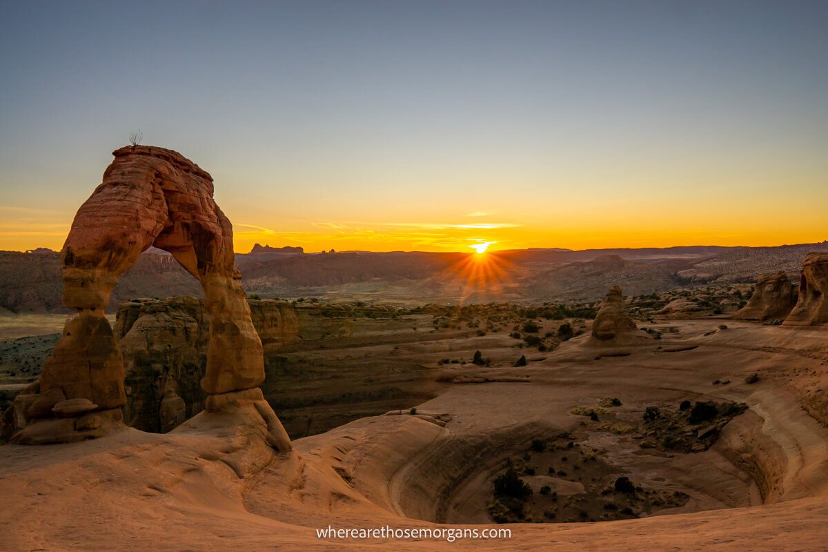 Sunset over Delicate Arch landscape during one of the best Utah road trips