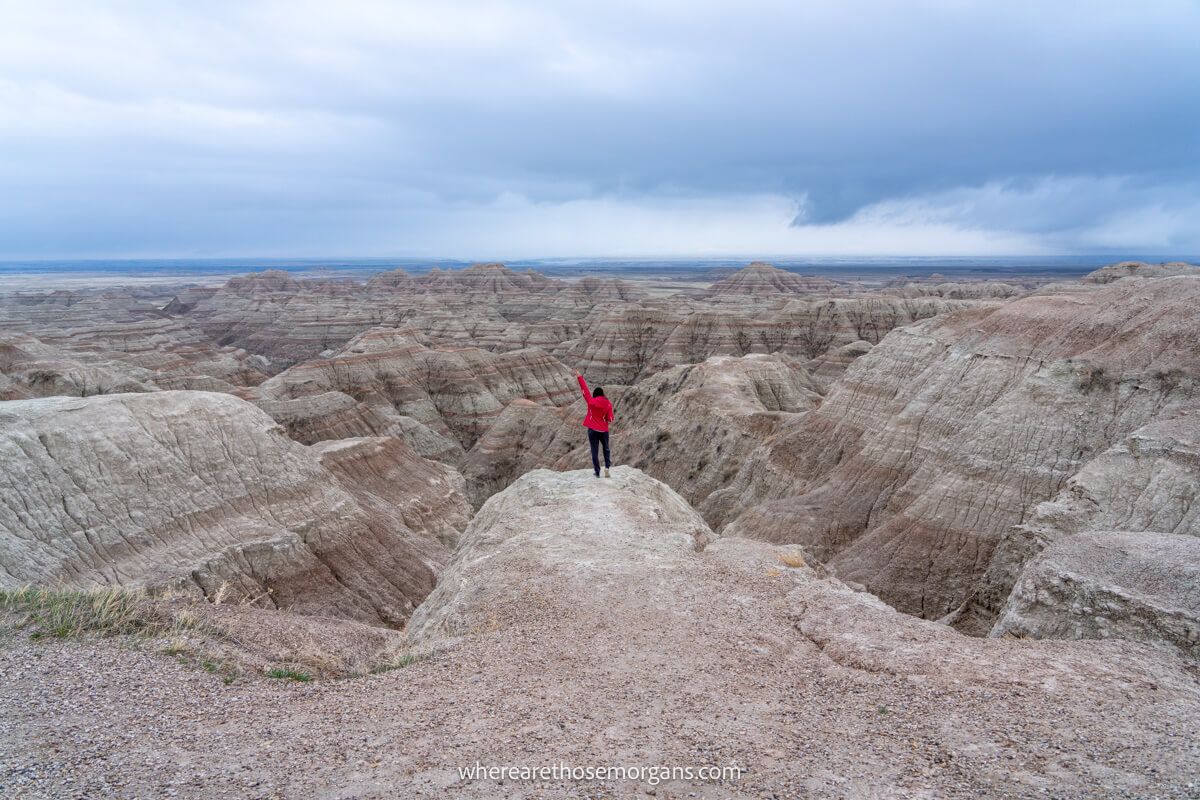 Woman posing for a photo on the Pinnacles Overlook
