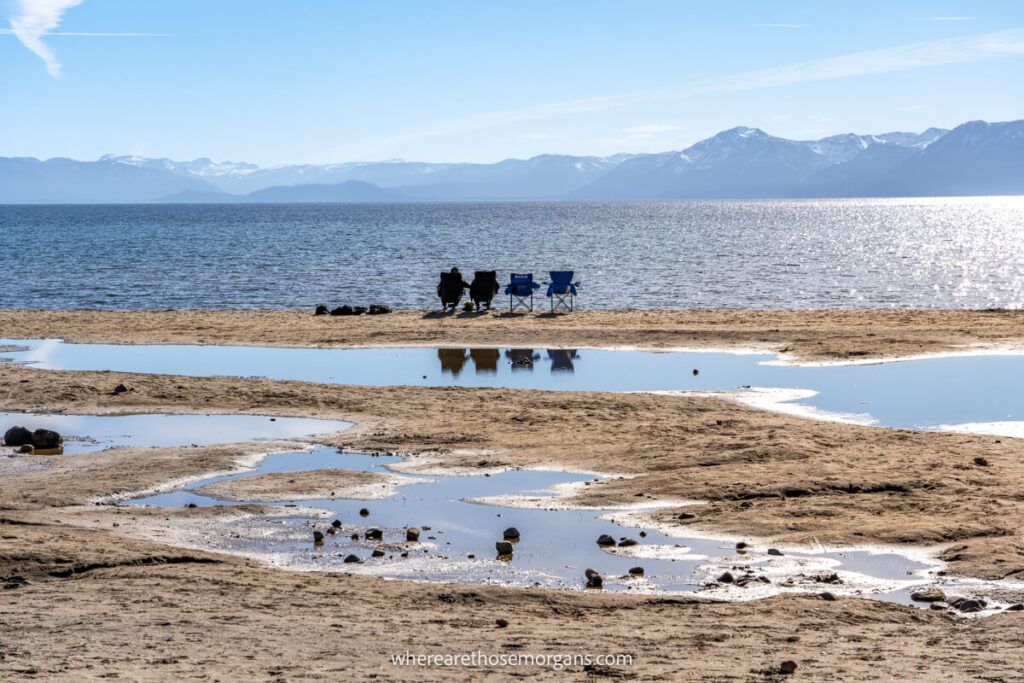 Four deck chairs on a north lake tahoe beach in late afternoon