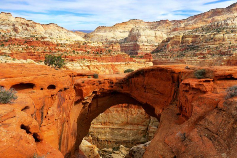Natural arch shaped sandstone formation in Utah