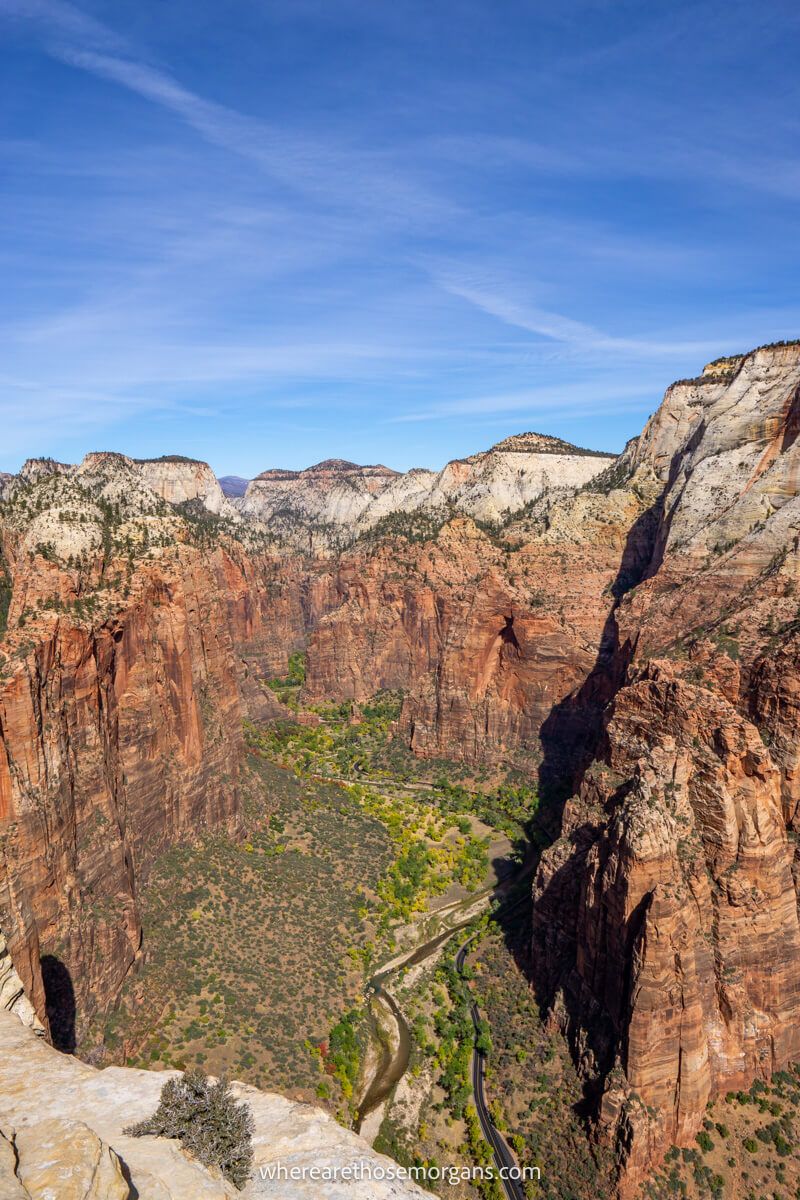 Deep canyon with towering sandstone cliffs around the best hiking trails in Utah