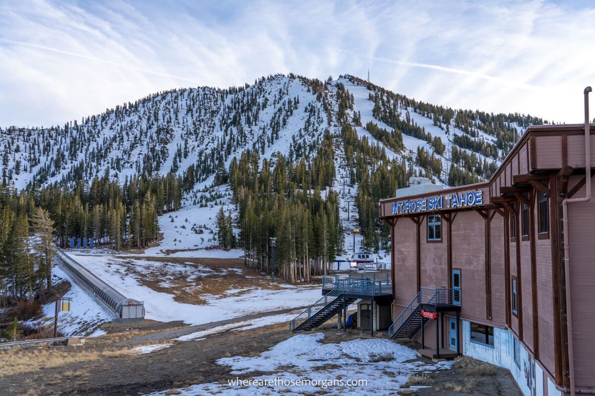 Ski resort with light snow on the hills covered in trees in Nevada