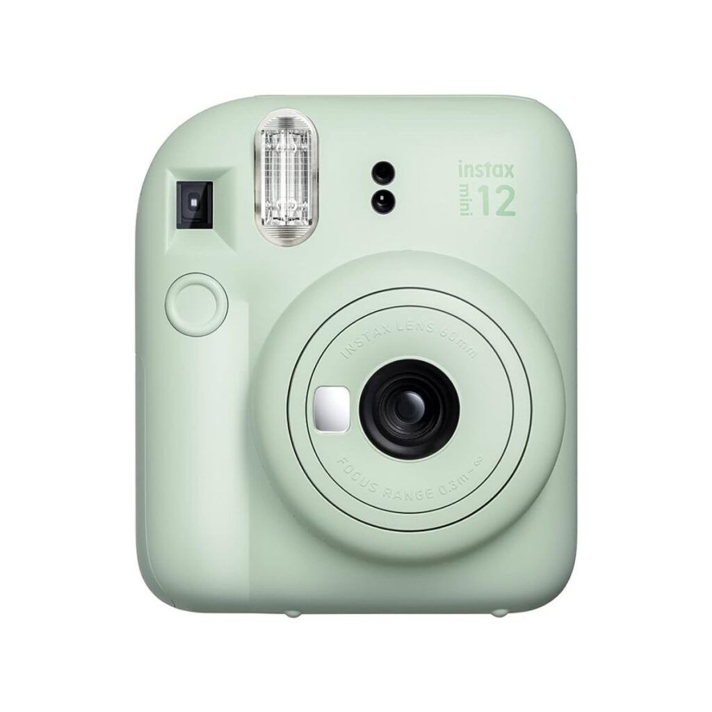 Green Fujifilm Instax Mini 12 for taking pictures