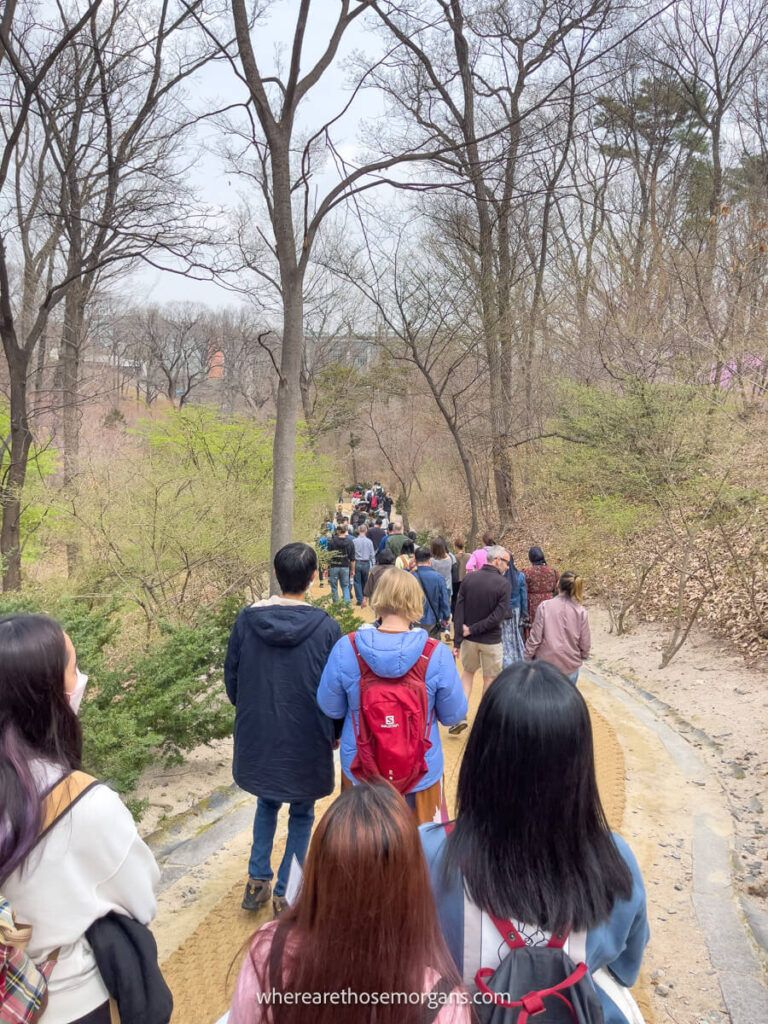 Visitors on a guided tour in Huwon Secret Garden