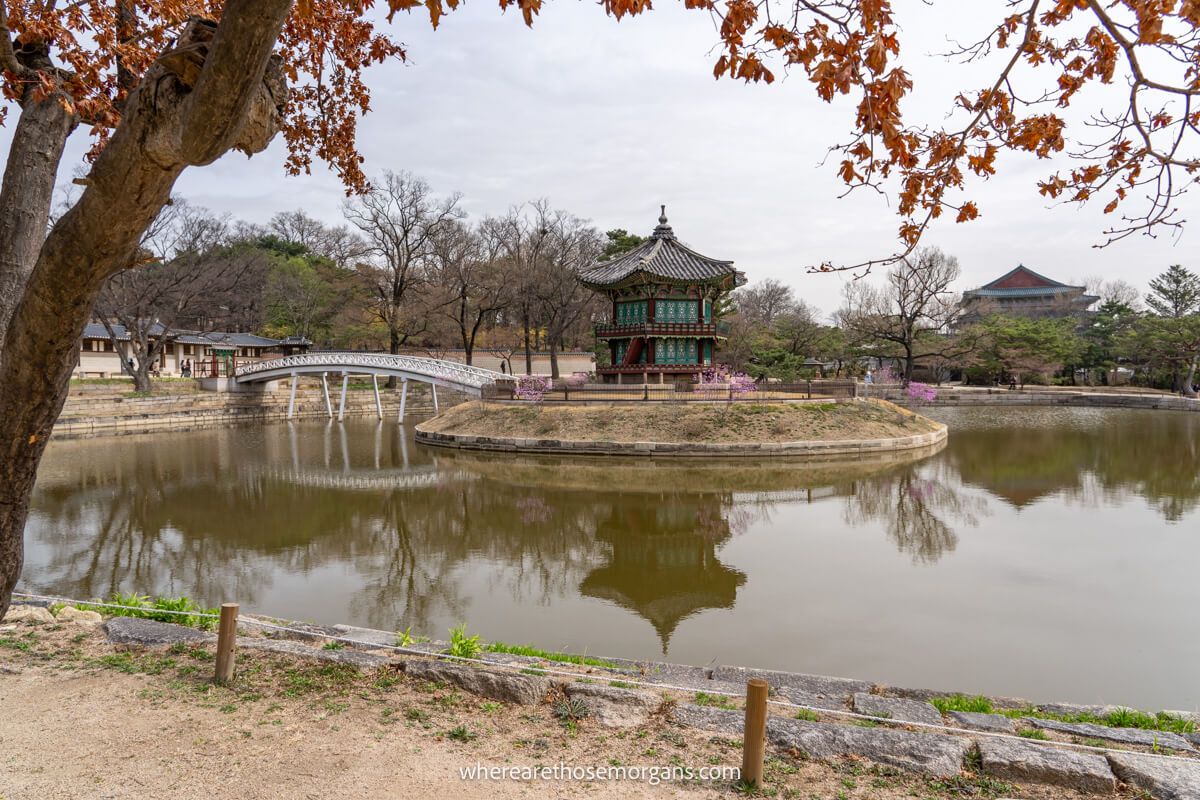 Hyangwonjeong Pavilion with reflection and white connecting bridge