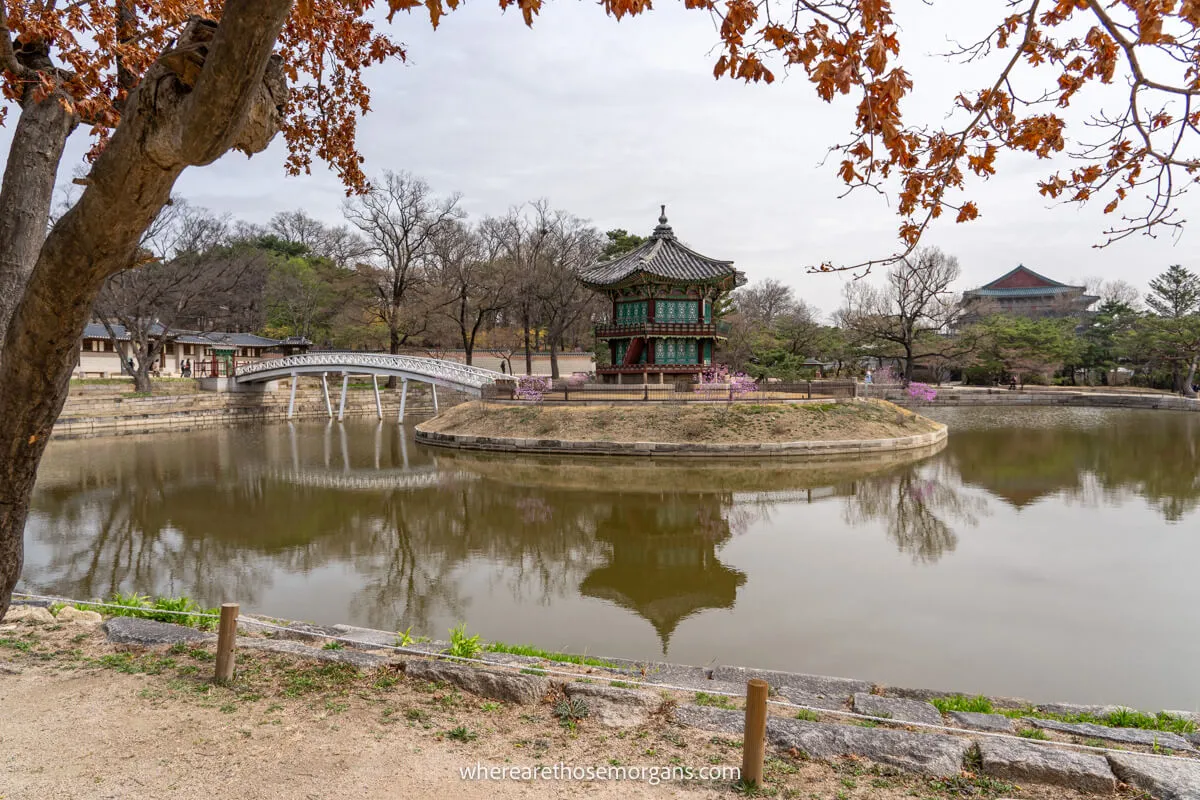 Hyangwonjeong Pavilion with reflection and white connecting bridge