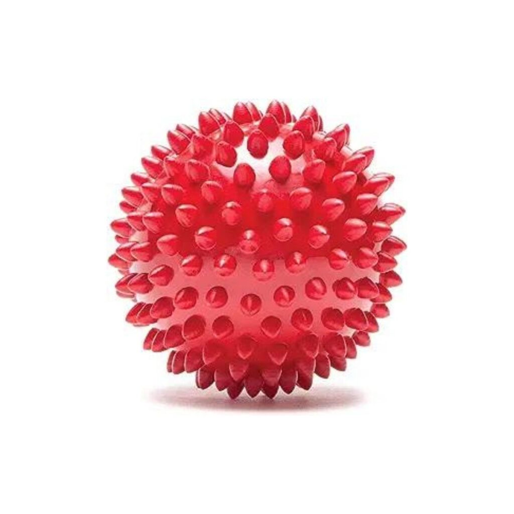 Red spiky massage ball to use after a long hike or an outdoor adventure