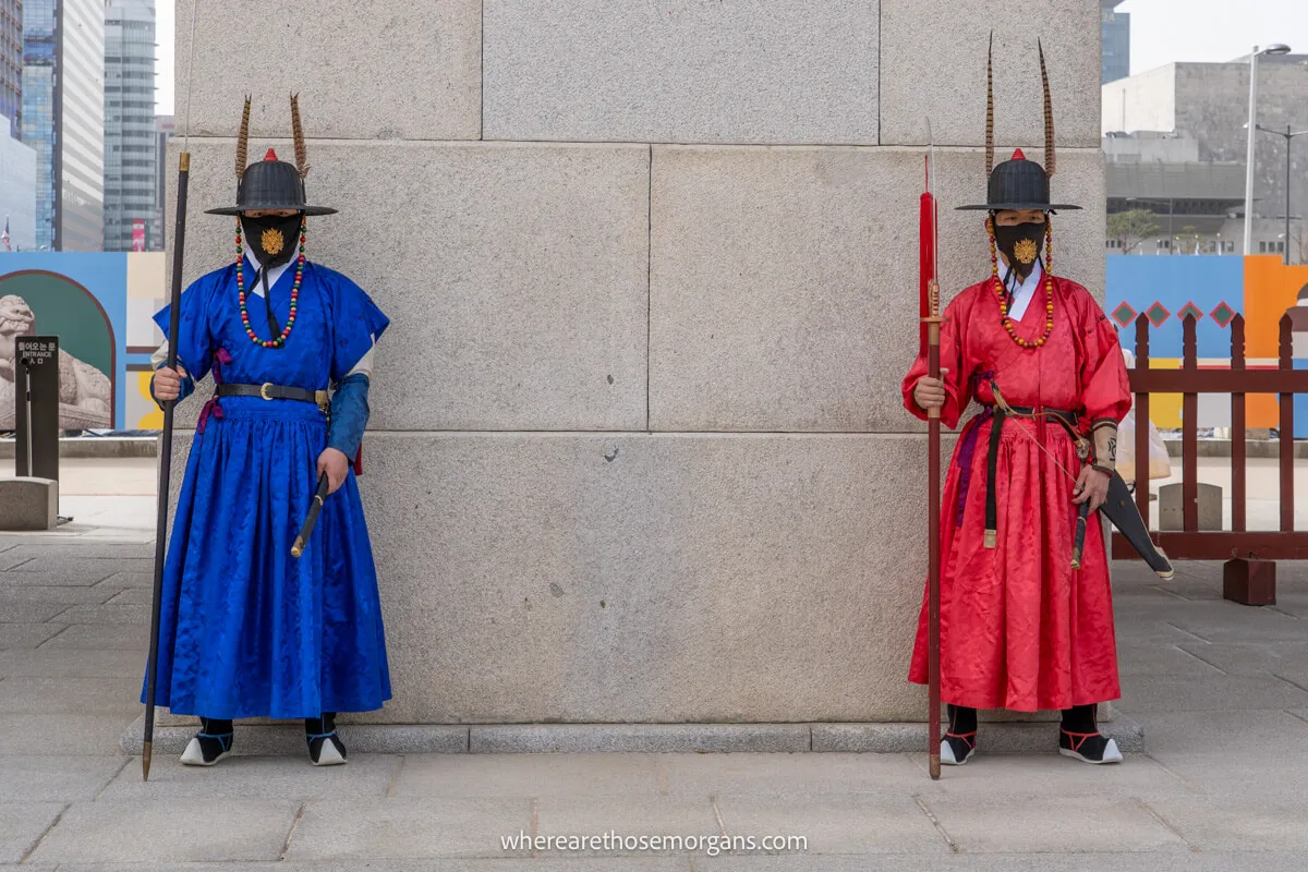 Two guards standing inside Gyeongbokgung Palace