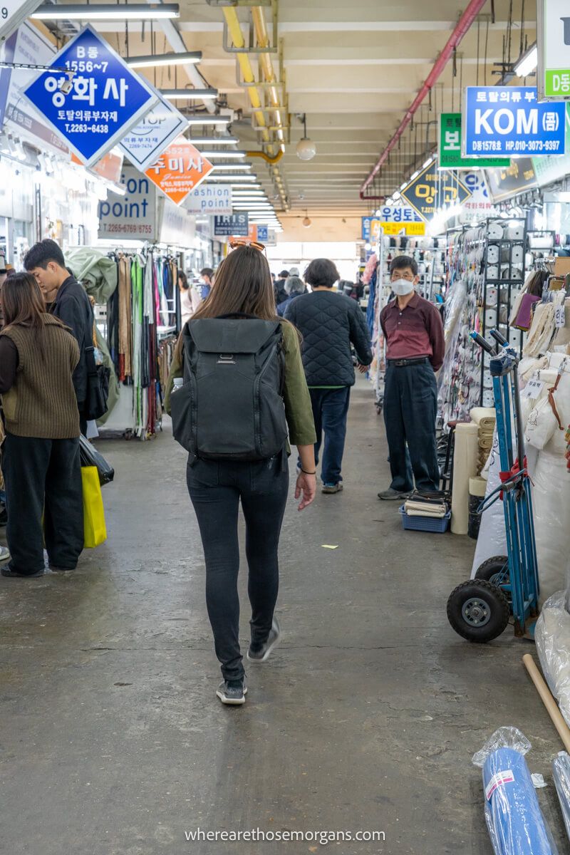Tourist walking through a market in South Korea