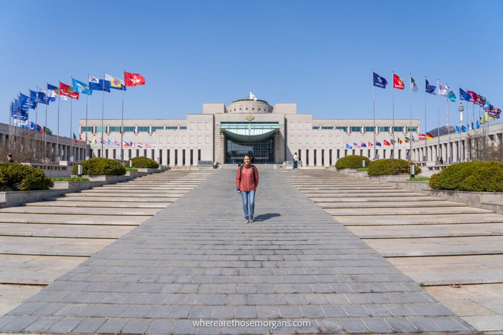 Tourist standing in front of the War Memorial of Korea in Seoul
