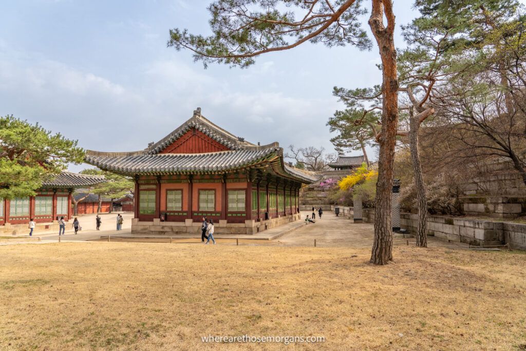 A red and green colored building inside Changgyeonggung Palace