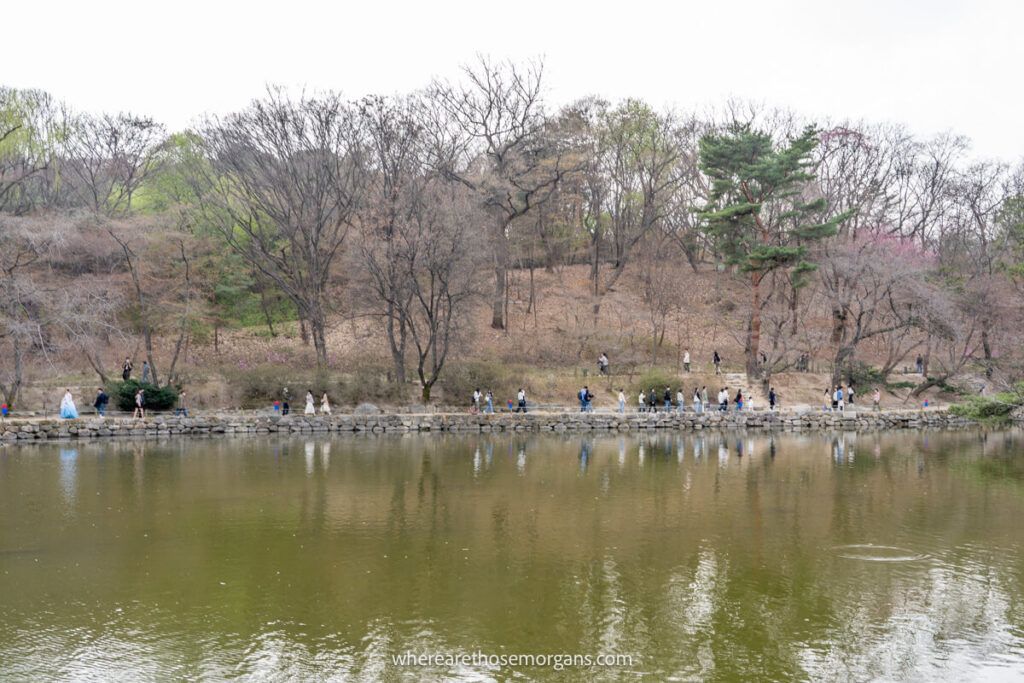 Visitors walking around Chundangji Pond