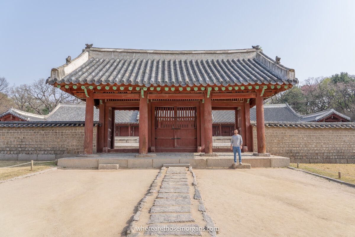Man standing at the gate for Yeongnyeongjeon Hall