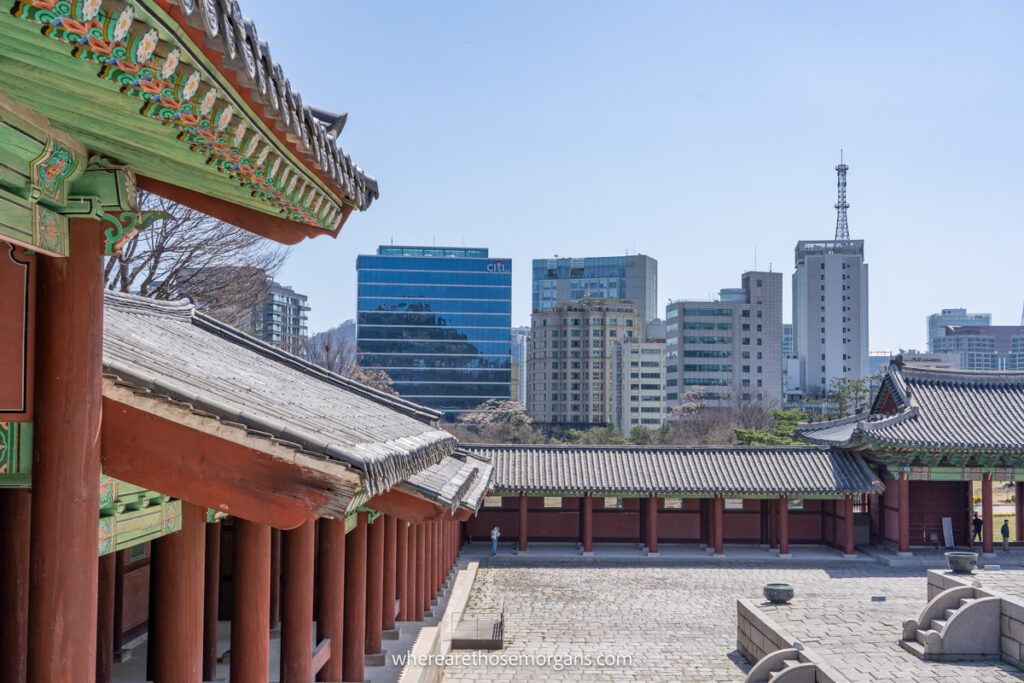 Gyeonghuigung Palace with Seoul city buildings in background