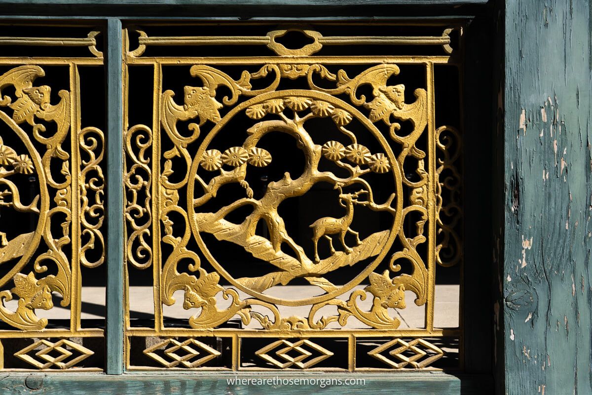 A gold painted decorative window inside Deoksugung Palace