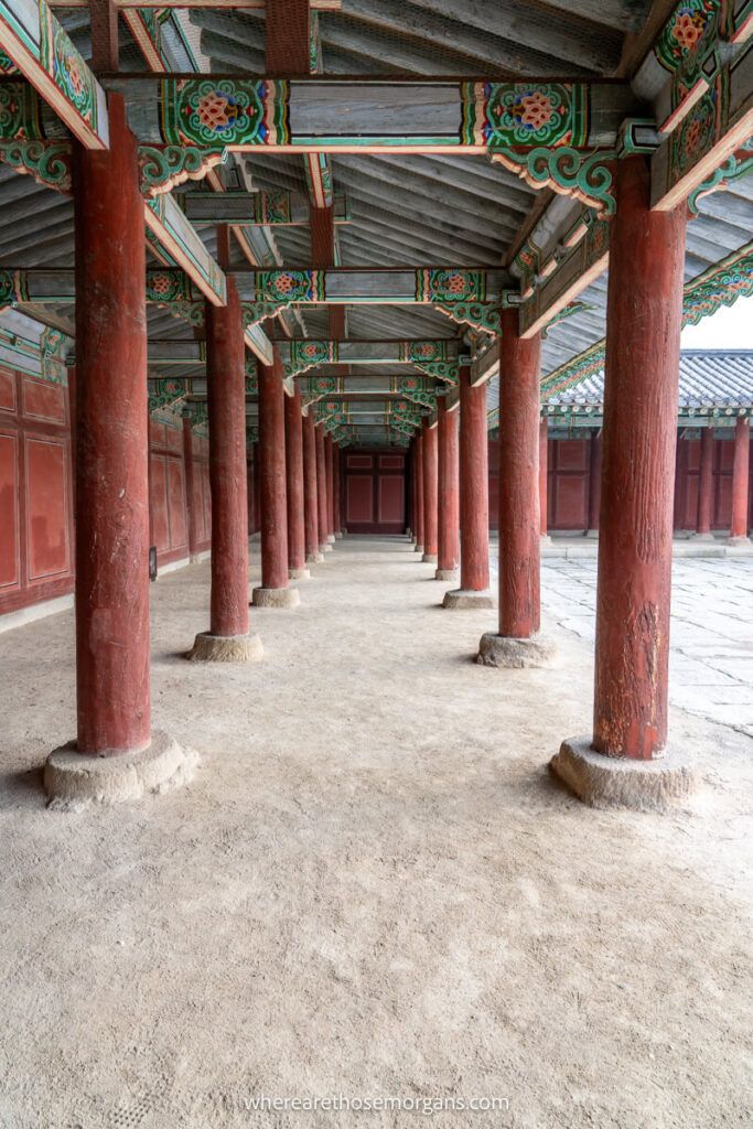 Large red pillars inside Changgyeonggung Palace in Seoul, South Korea