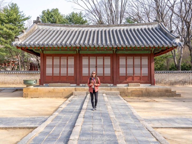 Woman standing in front of a building inside Jongmyo Shrine