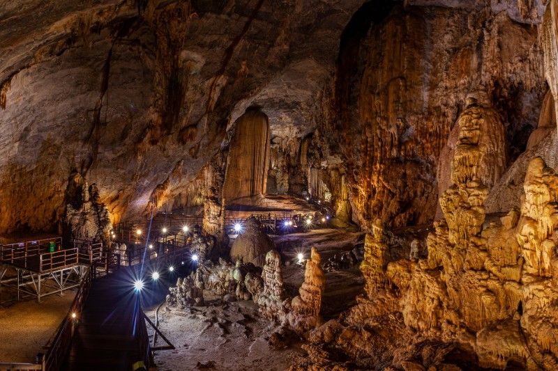 A wooden boardwalk leading through Paradise Cave in Phong Nha