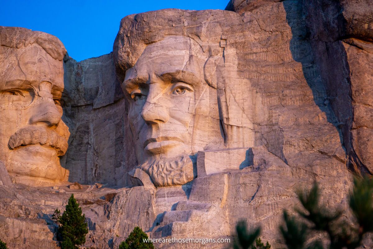 Close up of Lincoln in the Mt Rushmore sculpture at sunrise