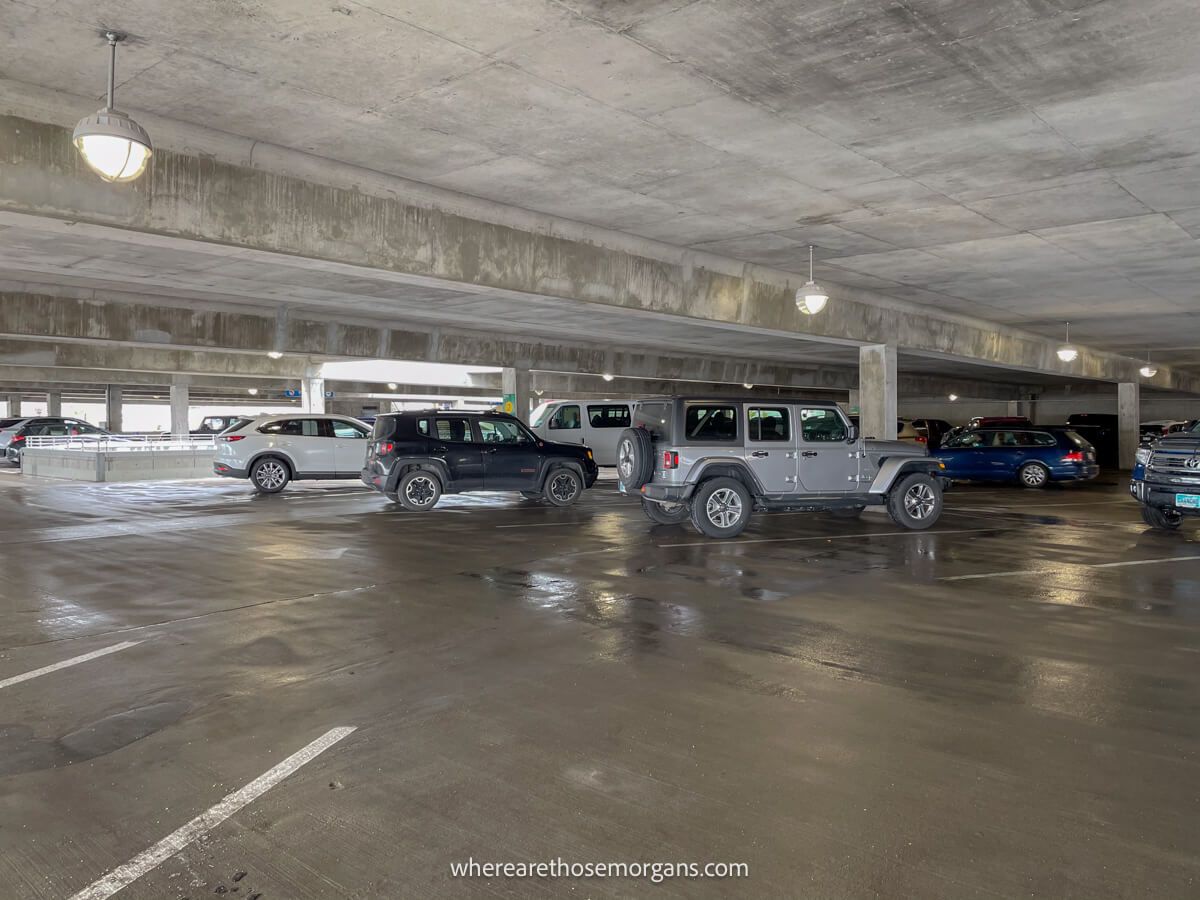 Cars parked inside a multi story concrete parking lot at Mt Rushmore