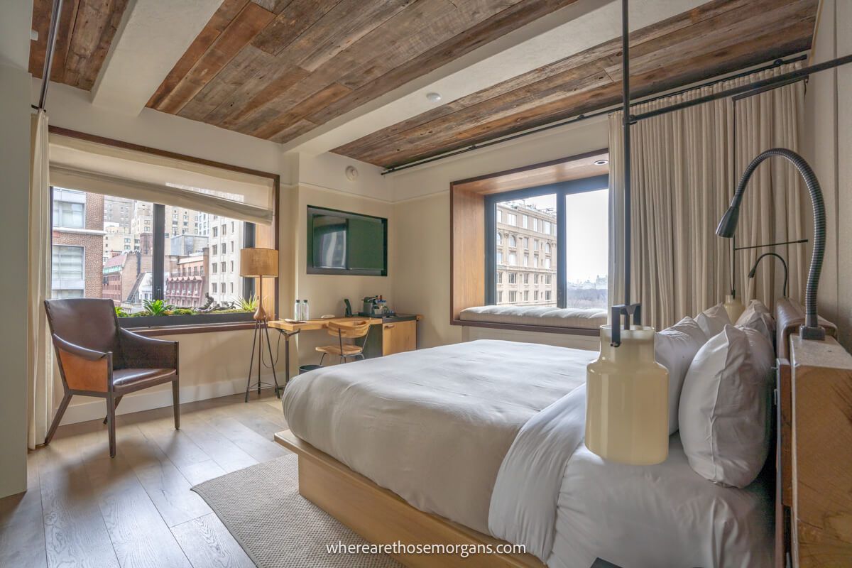 Photo inside a hotel room at 1 hotel Central Park in NYC, wooden furnishings and lots of light