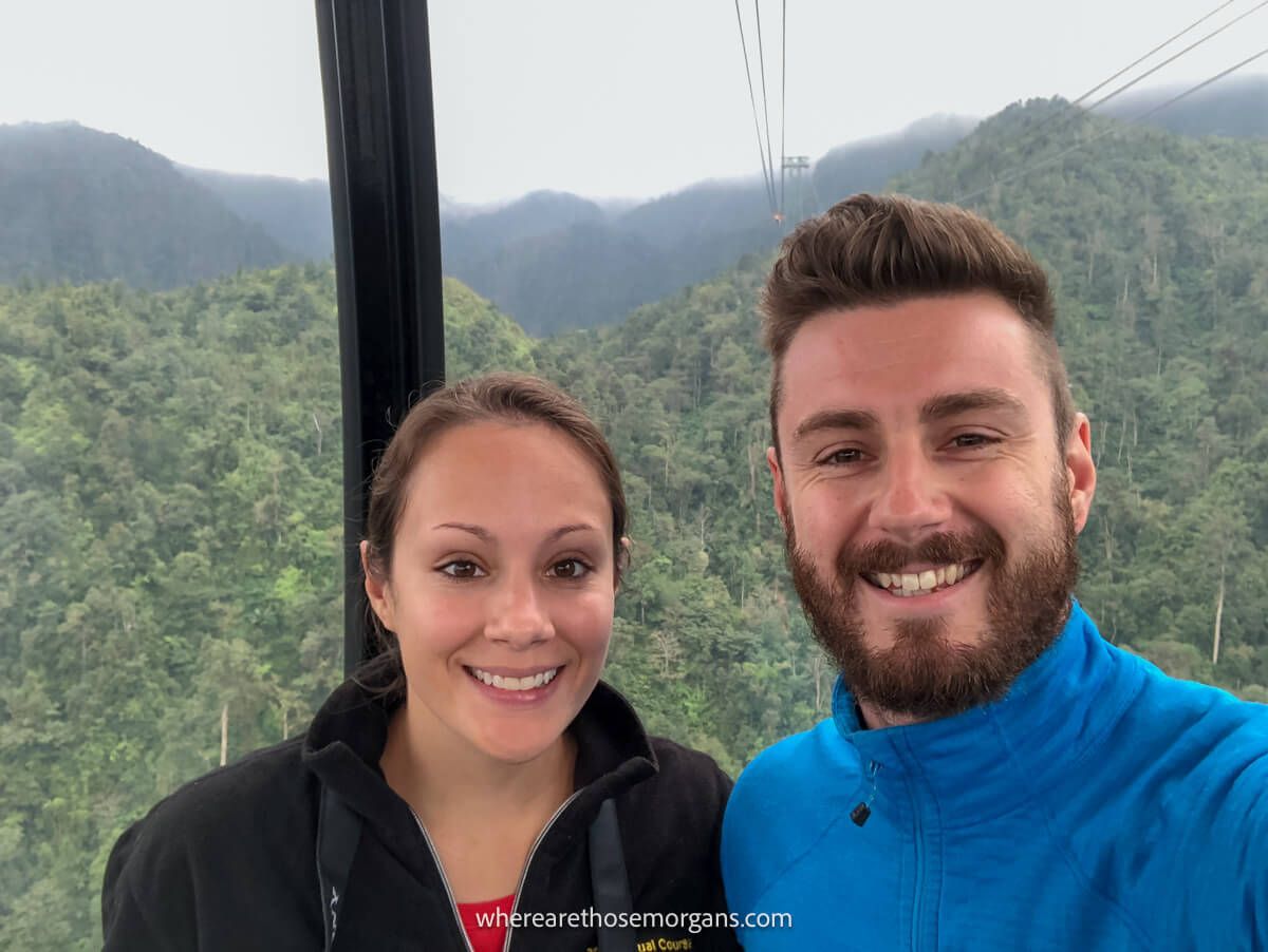 Two people taking a photo on the Fansipan cable car near Sapa