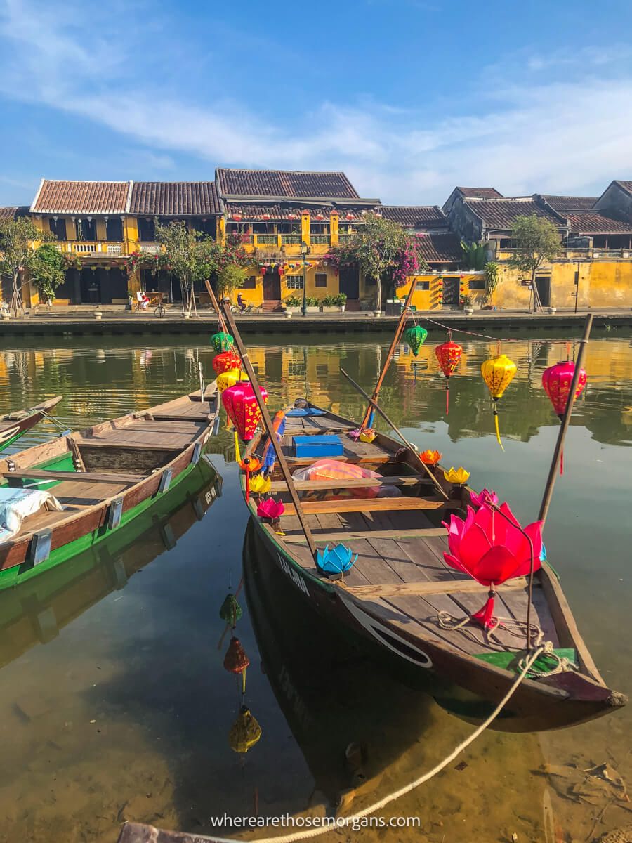 Two boats sitting in the water in Hoi An, Vietnam