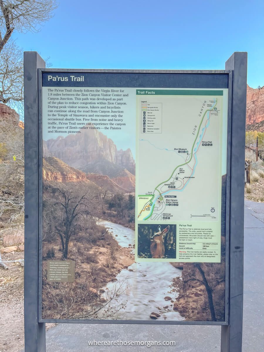 Photo of the Pa'rus Trail information board at Zion visitor center on a clear sunny day