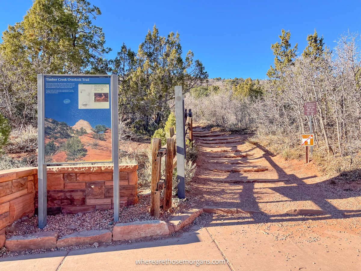Photo of Timber Creek Overlook Trailhead with information board on a sunny day in Zion