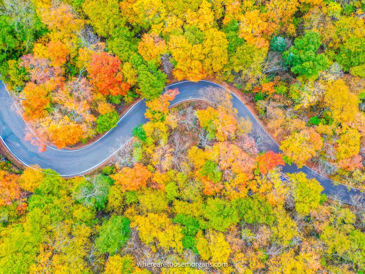 Vibrant fall foliage along smugglers notch during a Vermont road trip