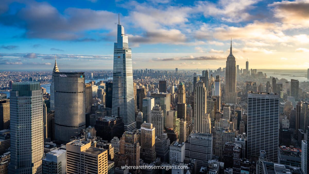 City skyline from above with hundreds of skyscrapers at sunset