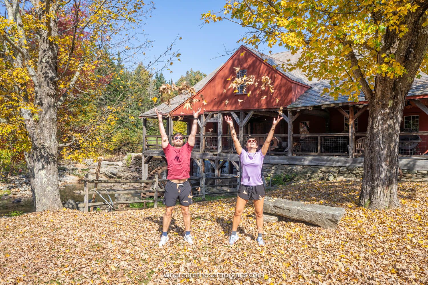 where are those morgans vermont Photo of Mark and Kristen Morgan from Where Are Those Morgans standing on a river bank covered in brown leaves throwing more leaves in the air next to an old water mill in Vermont