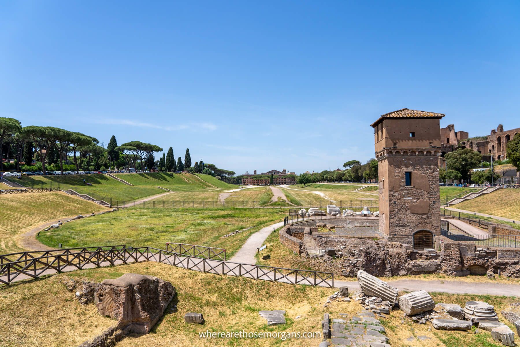 Photo of the ruins at Circus Maximus in Rome on a clear day with blue sky