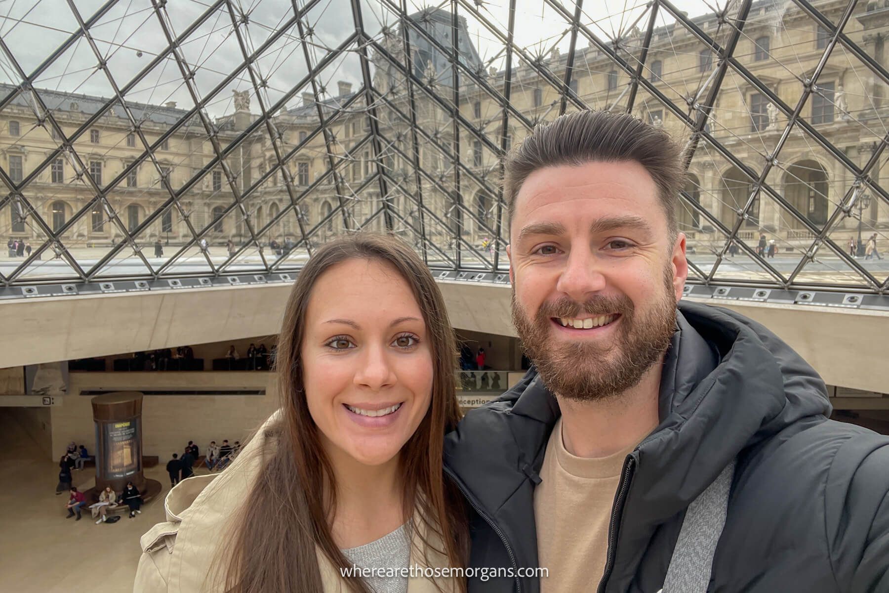 where are those morgans france Photo of Mark and Kristen Morgan from Where Are Those Morgans taking a selfie inside the Louvre museum in Paris, France