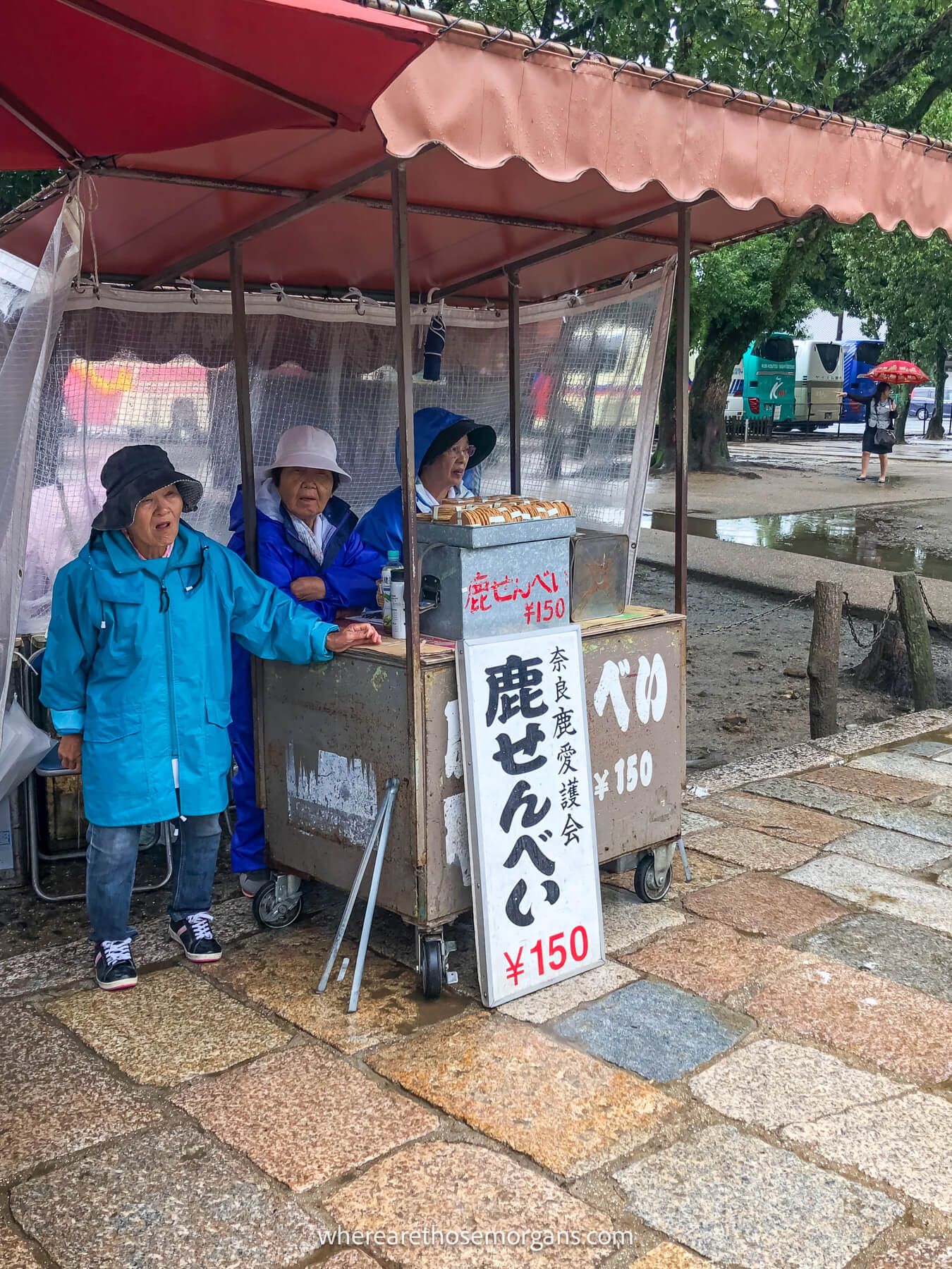 Women at a stand selling deer crackers