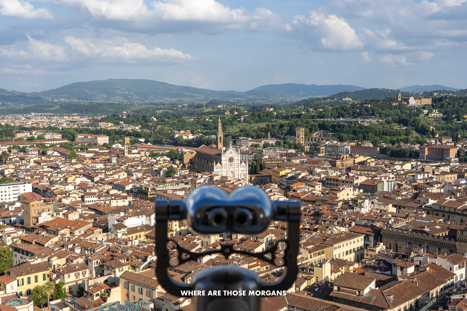 Photo of viewing binoculars looking at the Basilica di Santa Croce from the top of Florence Duomo Dome