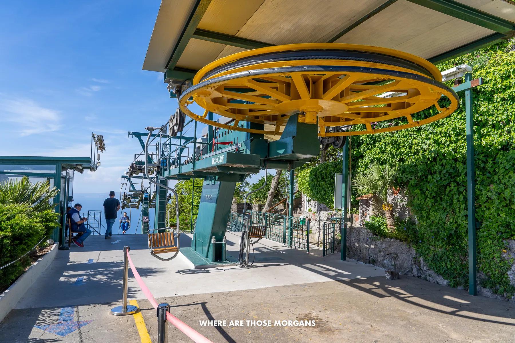 Photo of the top of a cable car ride slowly moving in a circle in Italy
