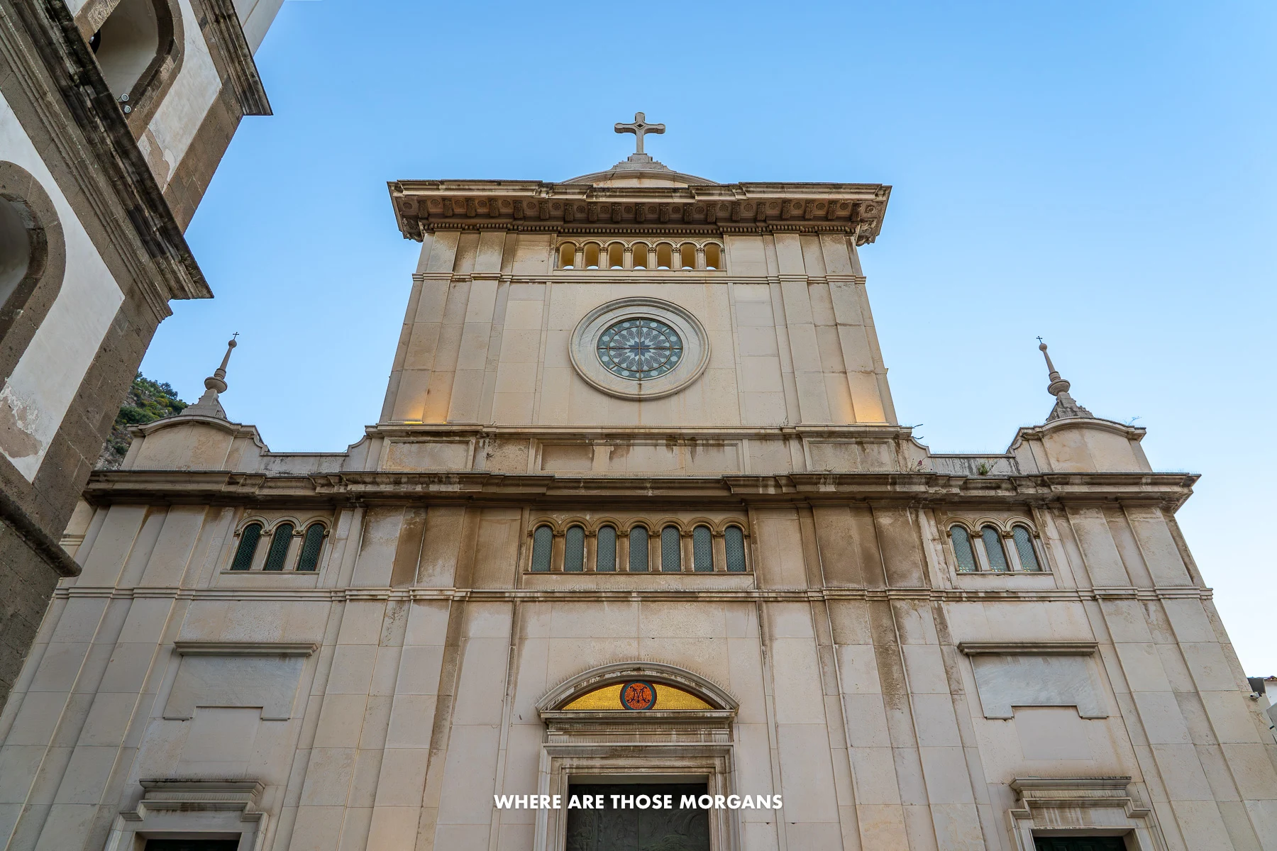 Close up photo looking up at the entrance to Chiesa di Santa Maria Assunta in the Amalfi Coast