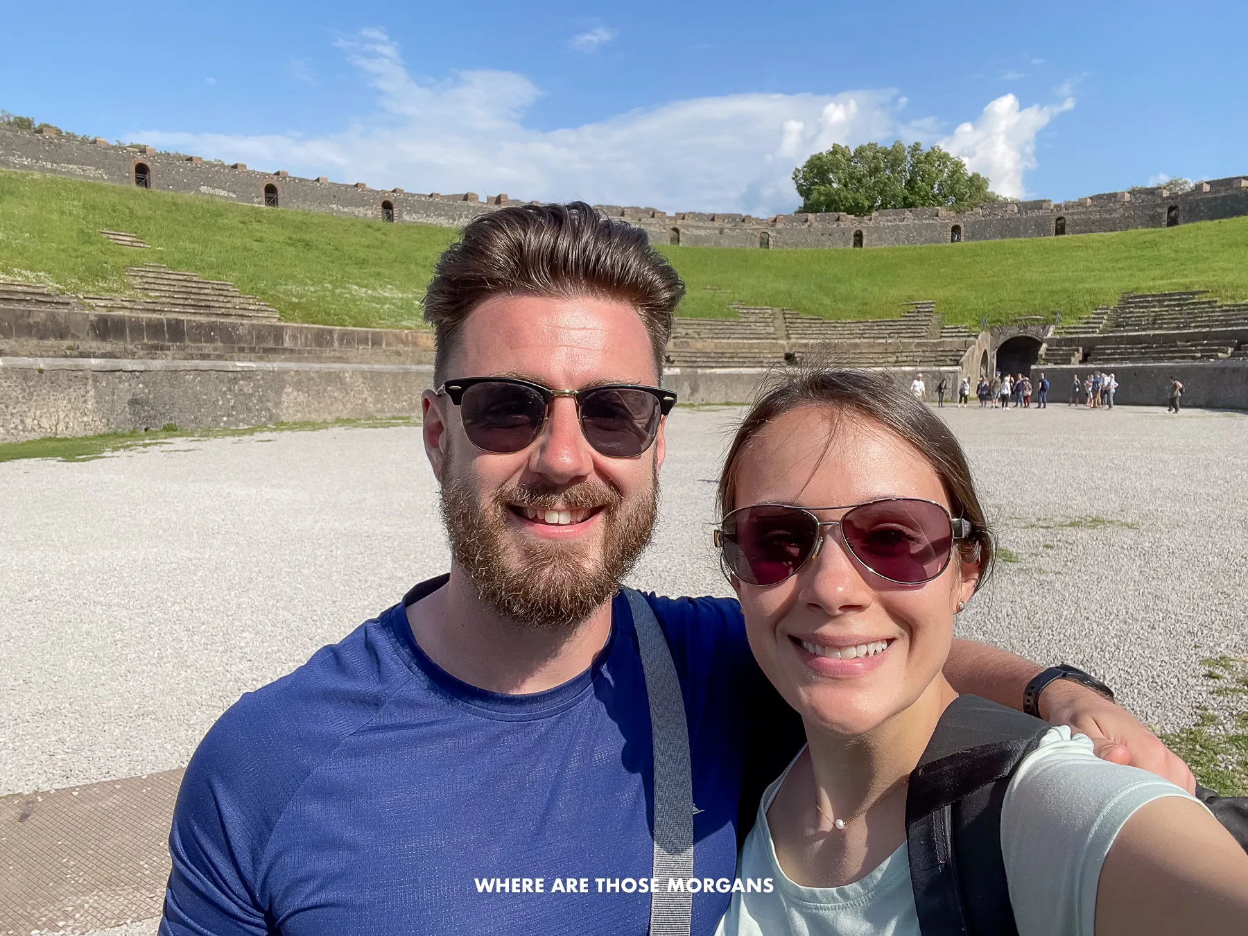 Photo of Mark and Kristen from Where Are Those Morgans taking a selfie inside Pompeii Amphitheater