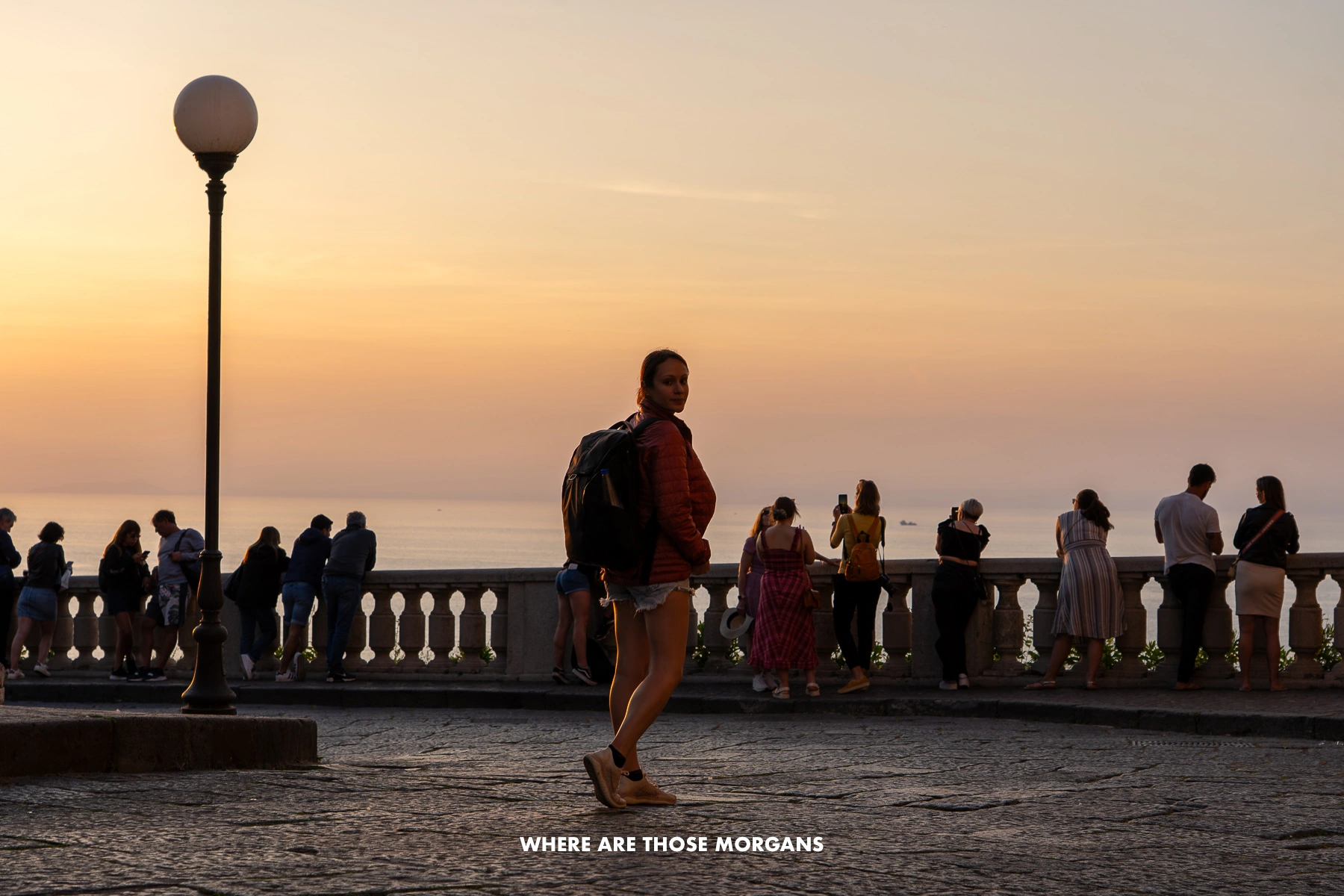 Photo of Kristen from Where Are Those Morgans walking up to the sunset viewing area at Villa Comunale in Sorrento
