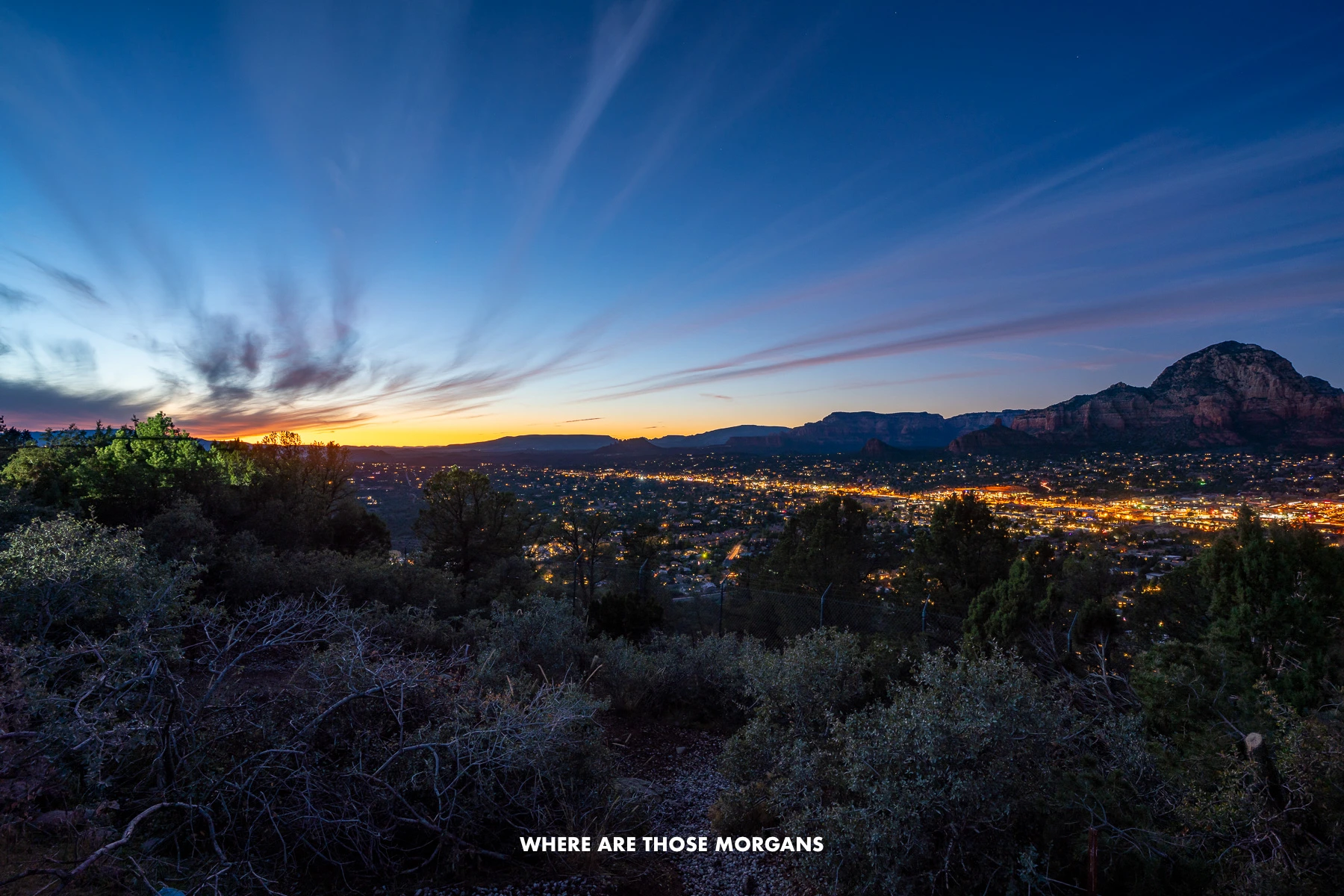 Photo of a sunset view over Sedona from an elevated vantage point