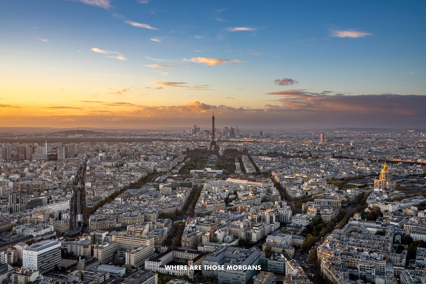 View over Paris from the top of Montparnasse Tower at sunset