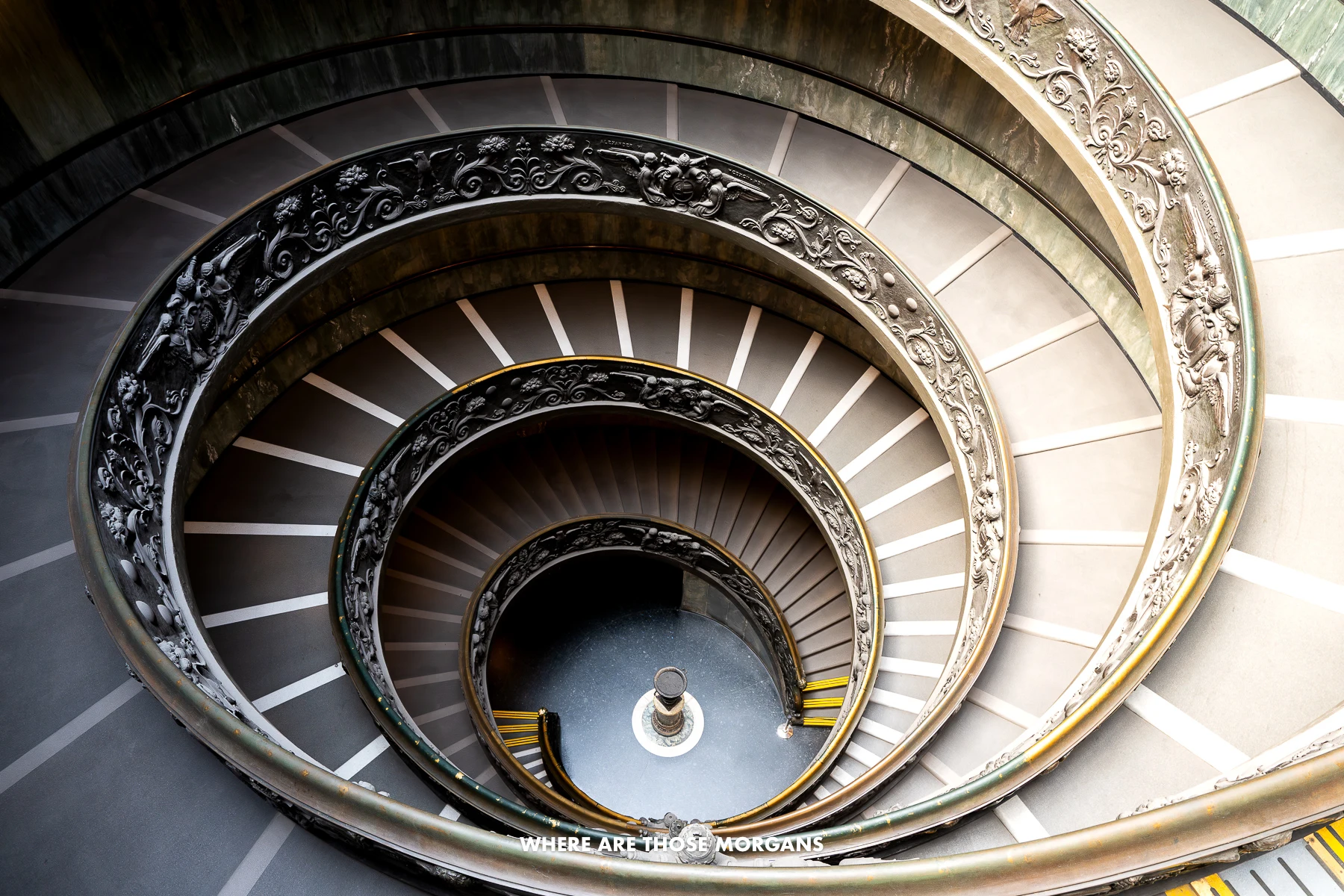 Spiraling double-helix staircase in the Vatican Museum with no people