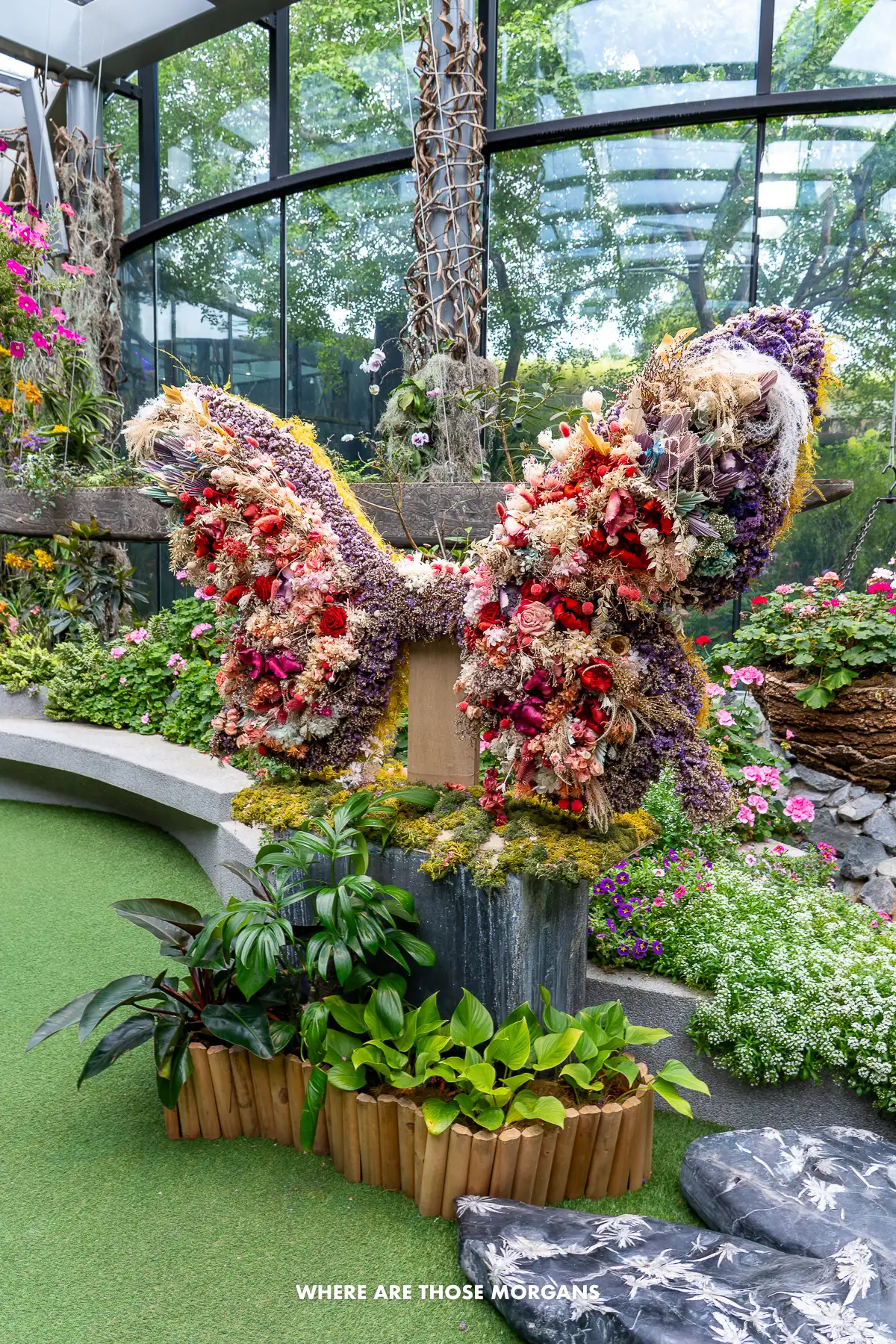 Butterfly floral display inside a glass building in Singapore