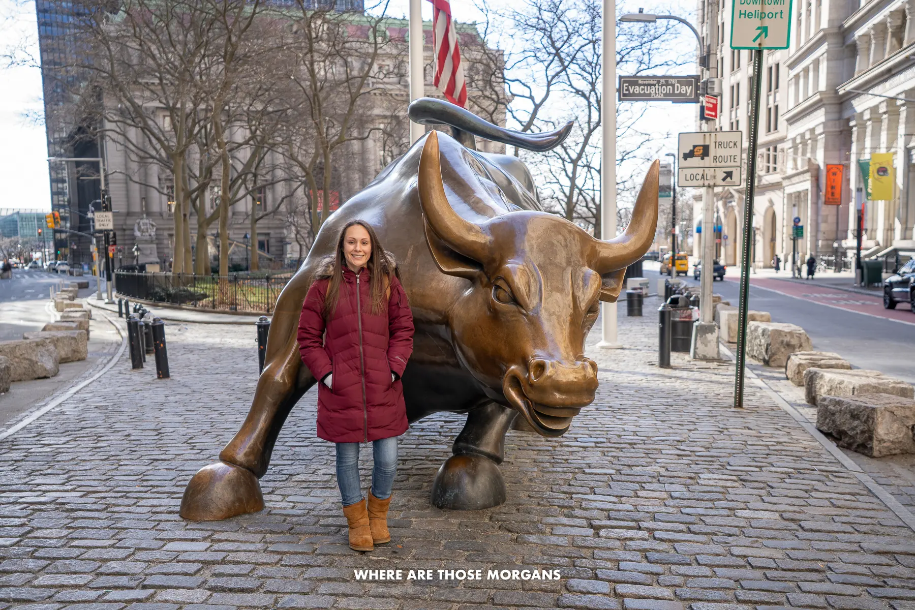 Kristen from Where Are Those Morgans standing with the Charging Bull in Lower Manhattan