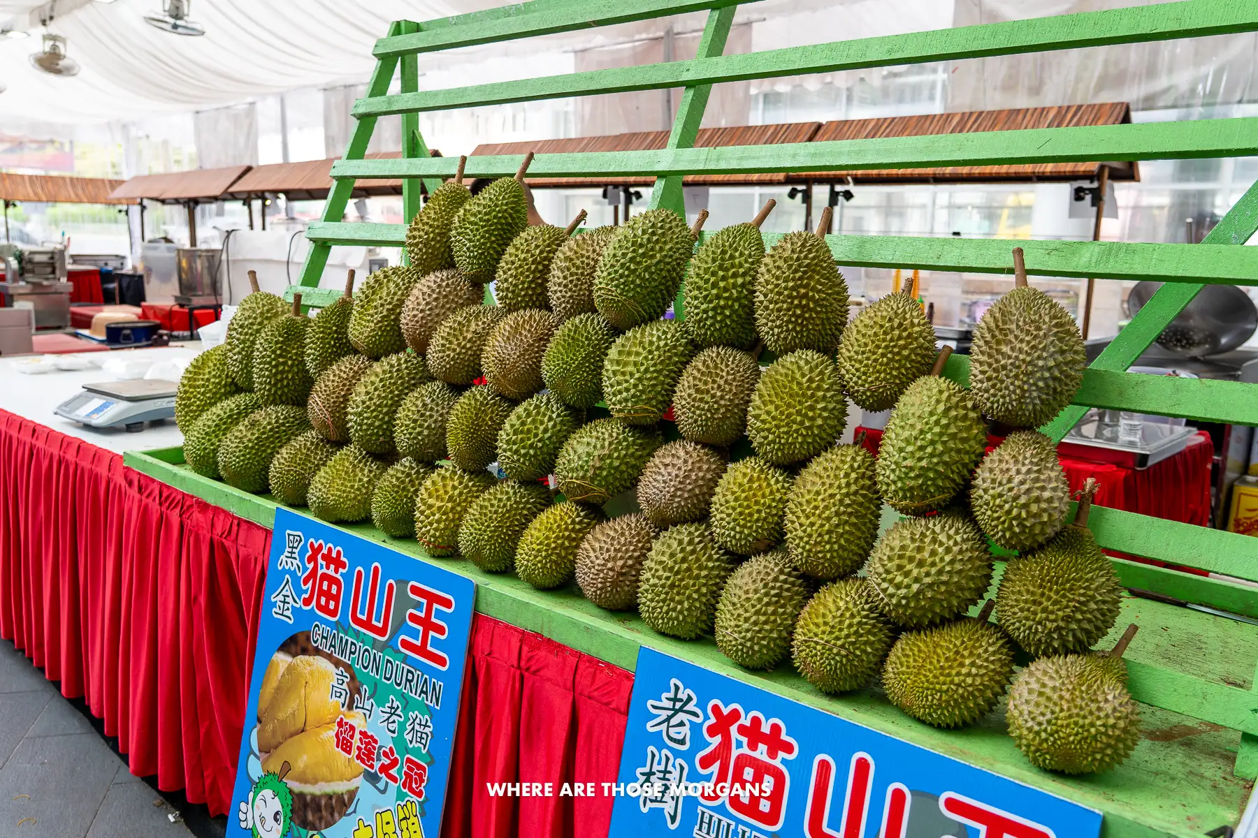 A food stall selling rows of durian in Singapore
