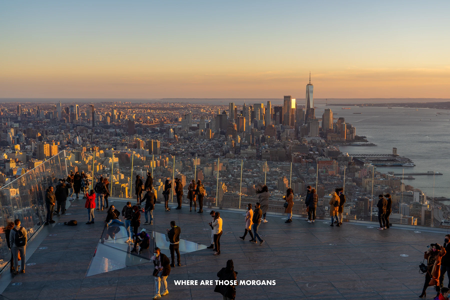 View over Manhattan from an open air outdoor viewing platform at sunset